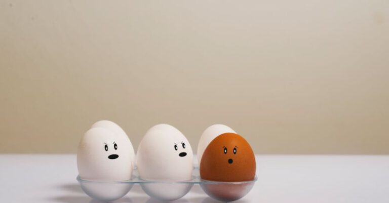 Differences - Eggs in Tray on White Surface