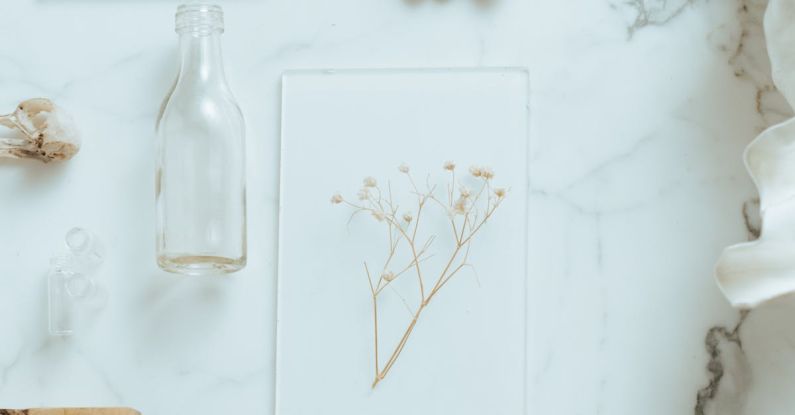 Elements - White Ceramic Angel Figurine on White Wooden Table