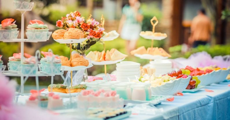 Events - Various Desserts on a Table covered with Baby Blue Cover