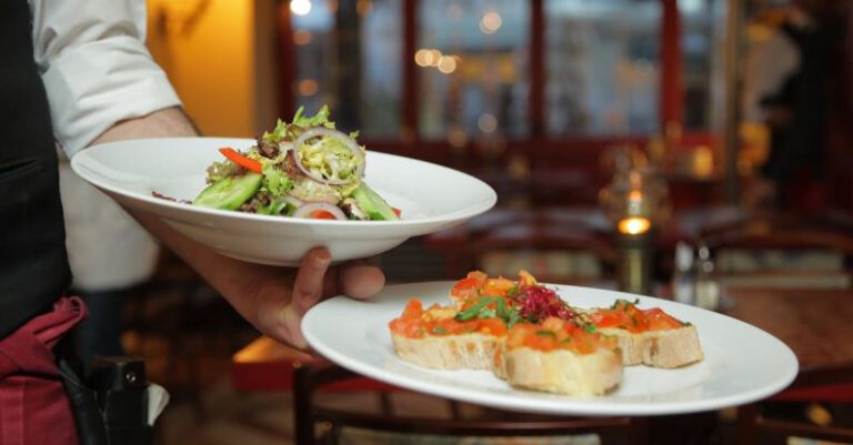 Restaurant - Person Holding Pastry Dishes on White Ceramic Plates